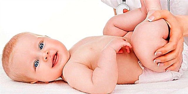 Massage for colic in a newborn - massage the tummy of the baby